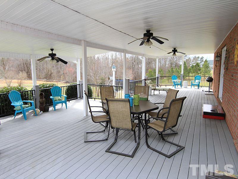 2200 Jim Latta Road Rougemont, NC 27572 - Photo 11 of 13 a view of a dining room with furniture window and wooden floor