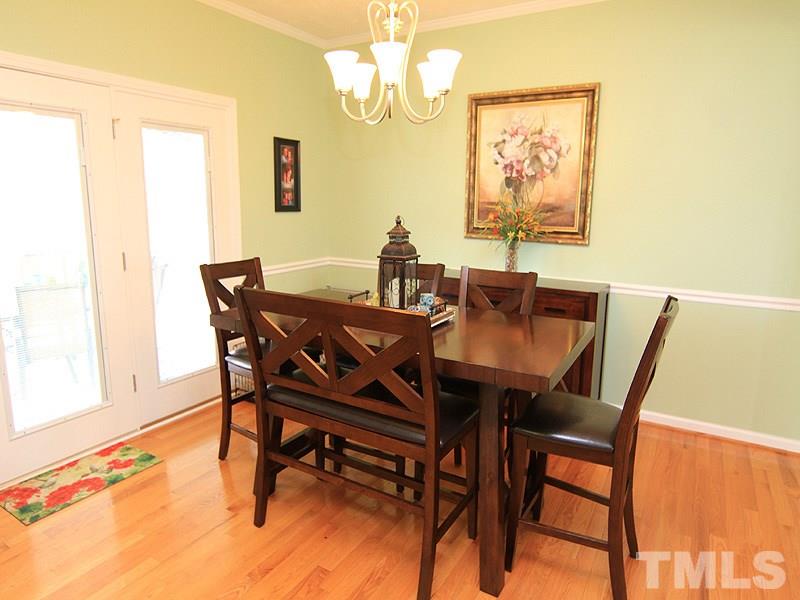 2200 Jim Latta Road Rougemont, NC 27572 - Photo 3 of 13 a view of a dining room with furniture and a chandelier
