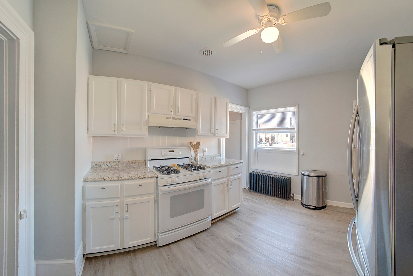 118 East 11th Street Lockport, IL 60441 - Photo 11 of 30 a kitchen with a stove oven and sink