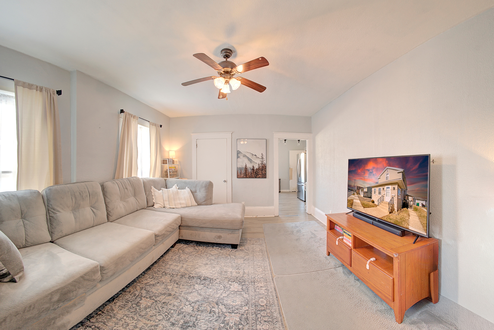 118 East 11th Street Lockport, IL 60441 - Photo 14 of 30 a living room with furniture and a flat screen tv