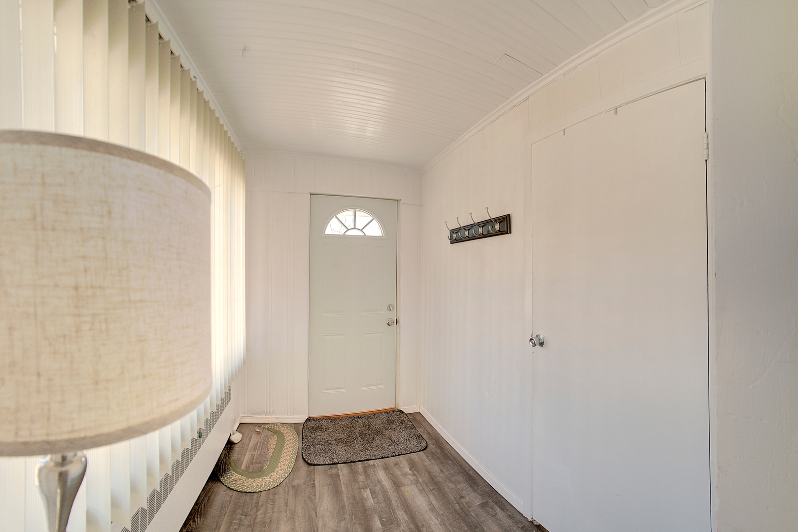 118 East 11th Street Lockport, IL 60441 - Photo 17 of 30 a view of a room with wooden floor and a hallway