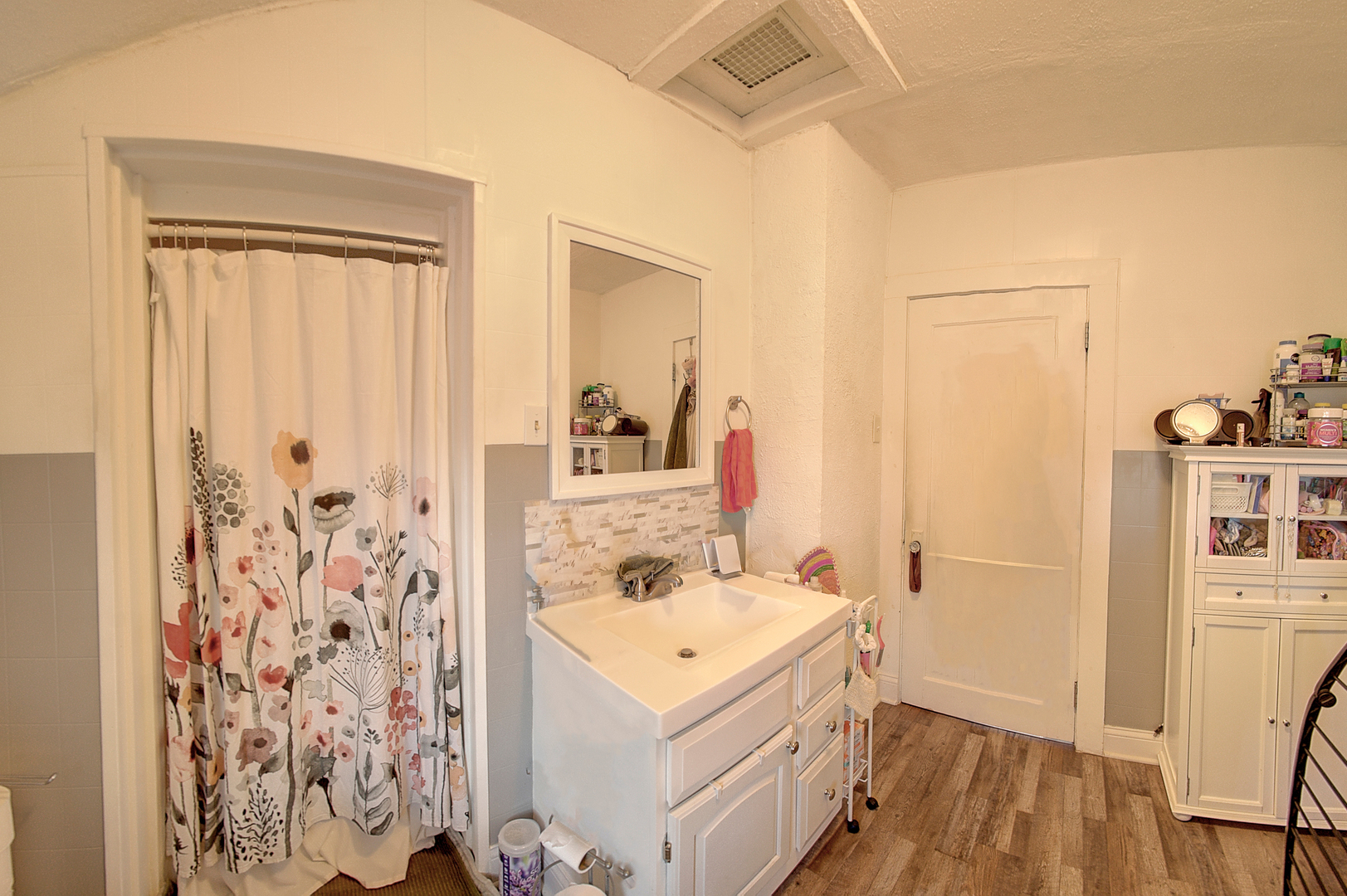 118 East 11th Street Lockport, IL 60441 - Photo 24 of 30 a bathroom with a sink a toilet and shower