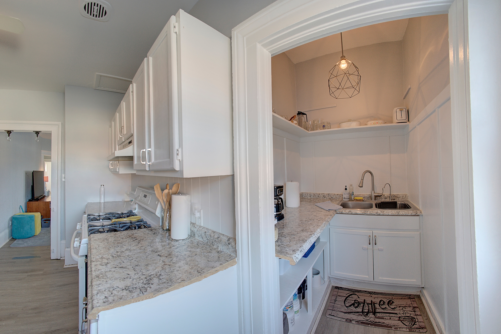 118 East 11th Street Lockport, IL 60441 - Photo 10 of 30 a kitchen with granite countertop a sink stove and cabinets