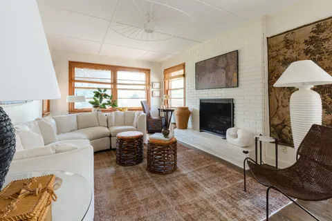 a kitchen with stainless steel appliances a stove microwave and cabinets