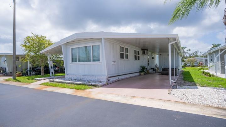 3301 Alt 19 Palm Harbor, Unit 317 Palm Harbor, FL 34683 - Photo 15 of 48 a view of outdoor space yard and porch