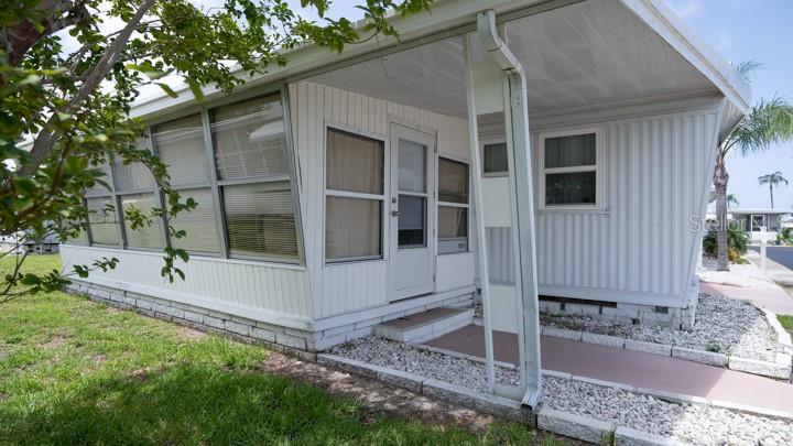 3301 Alt 19 Palm Harbor, Unit 317 Palm Harbor, FL 34683 - Photo 20 of 48 a view of house with a outdoor space
