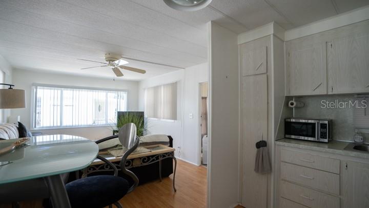 3301 Alt 19 Palm Harbor, Unit 317 Palm Harbor, FL 34683 - Photo 21 of 48 a view of a dining room with furniture window and outside view