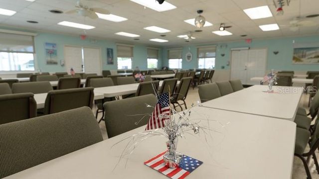 a view of a park that has a sign board
