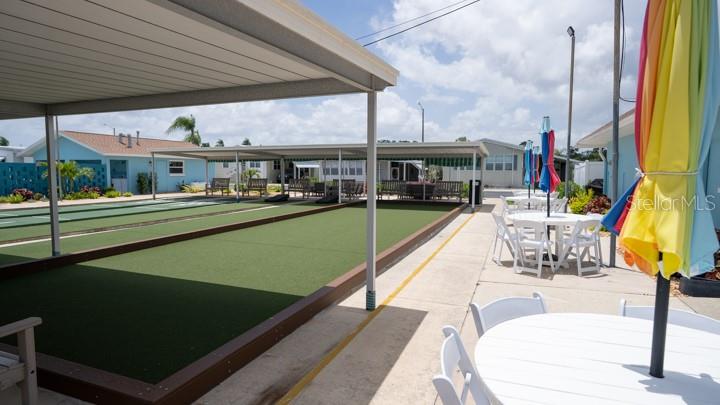 3301 Alt 19 Palm Harbor, Unit 317 Palm Harbor, FL 34683 - Photo 34 of 48 a view of a swimming pool with a deck