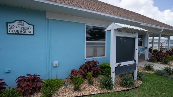3301 Alt 19 Palm Harbor, Unit 317 Palm Harbor, FL 34683 - Photo 36 of 48 a front view of a house with garden