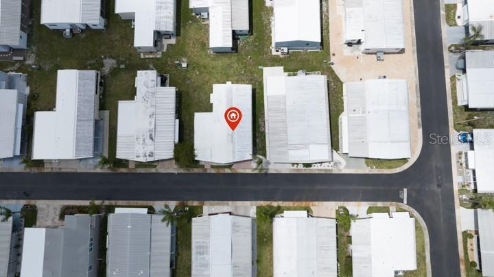 3301 Alt 19 Palm Harbor, Unit 317 Palm Harbor, FL 34683 - Photo 37 of 48 a front view of a building with glass windows