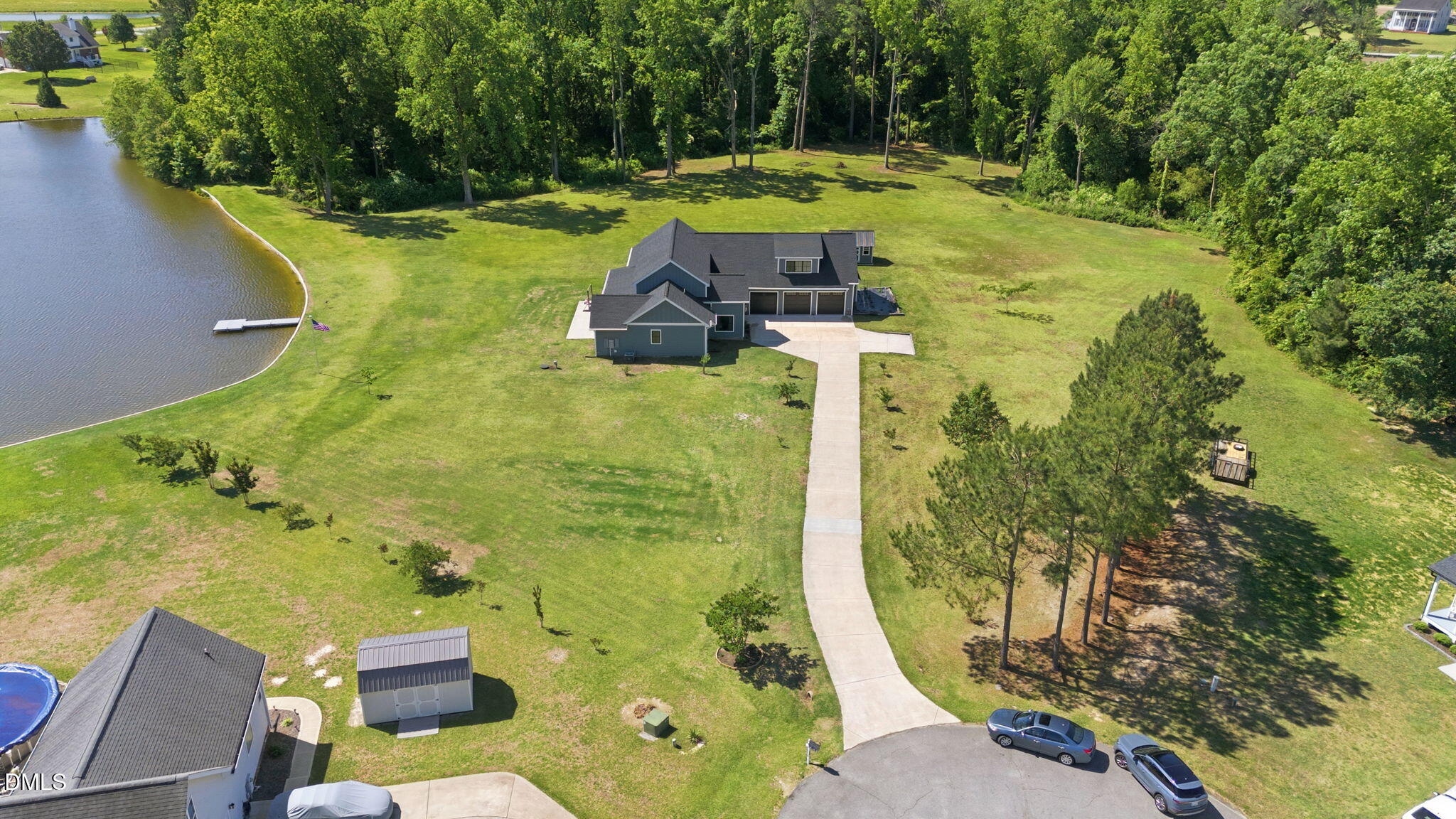 35 North Rippling Court Smithfield, NC 27577 - Photo 3 of 59 a view of a swimming pool with a yard