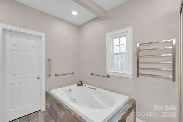 a view of entryway with wooden floor and stair