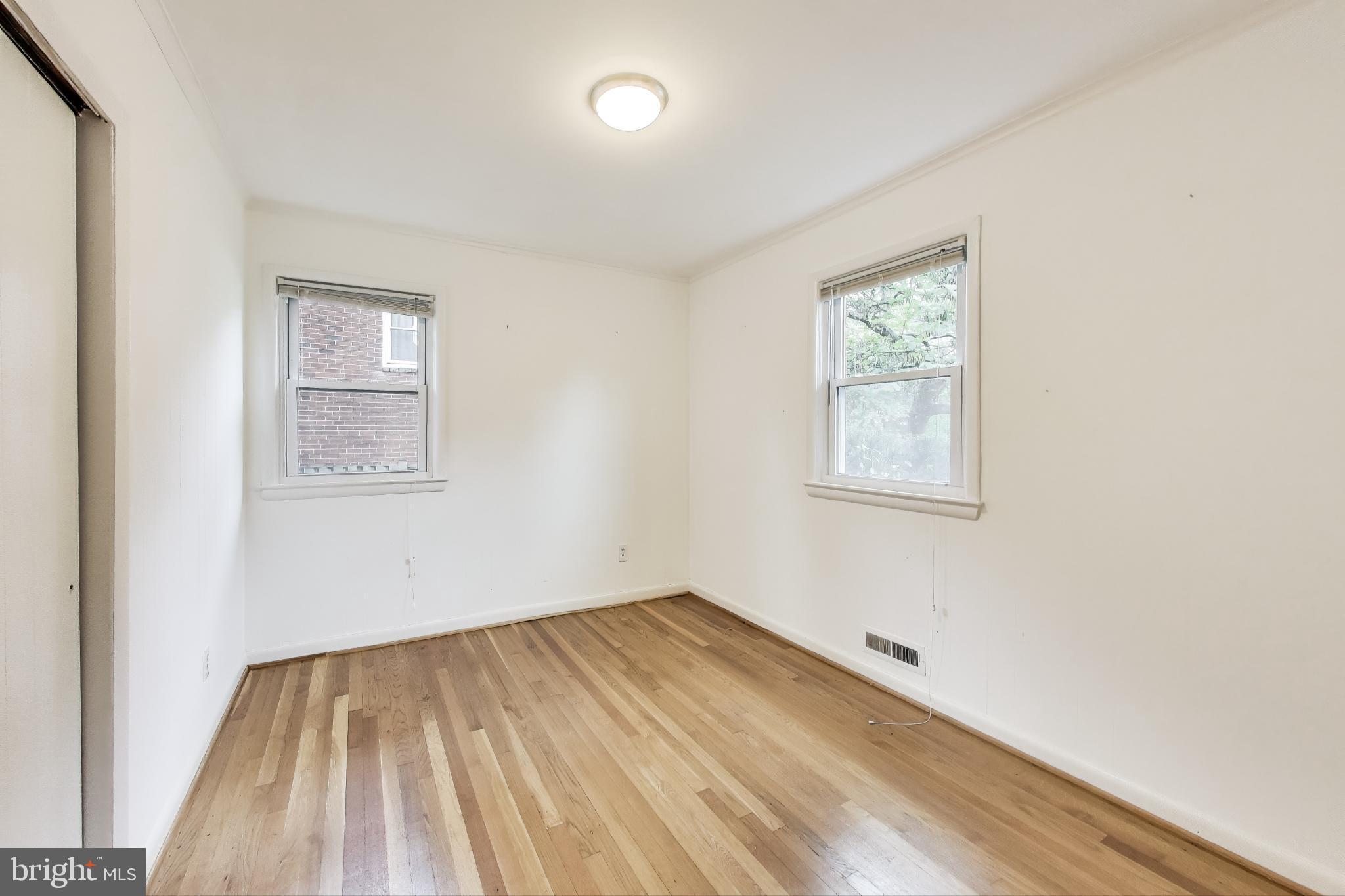 10019 Greenock Road Silver Spring, MD 20901 - Photo 16 of 39 an empty room with a window