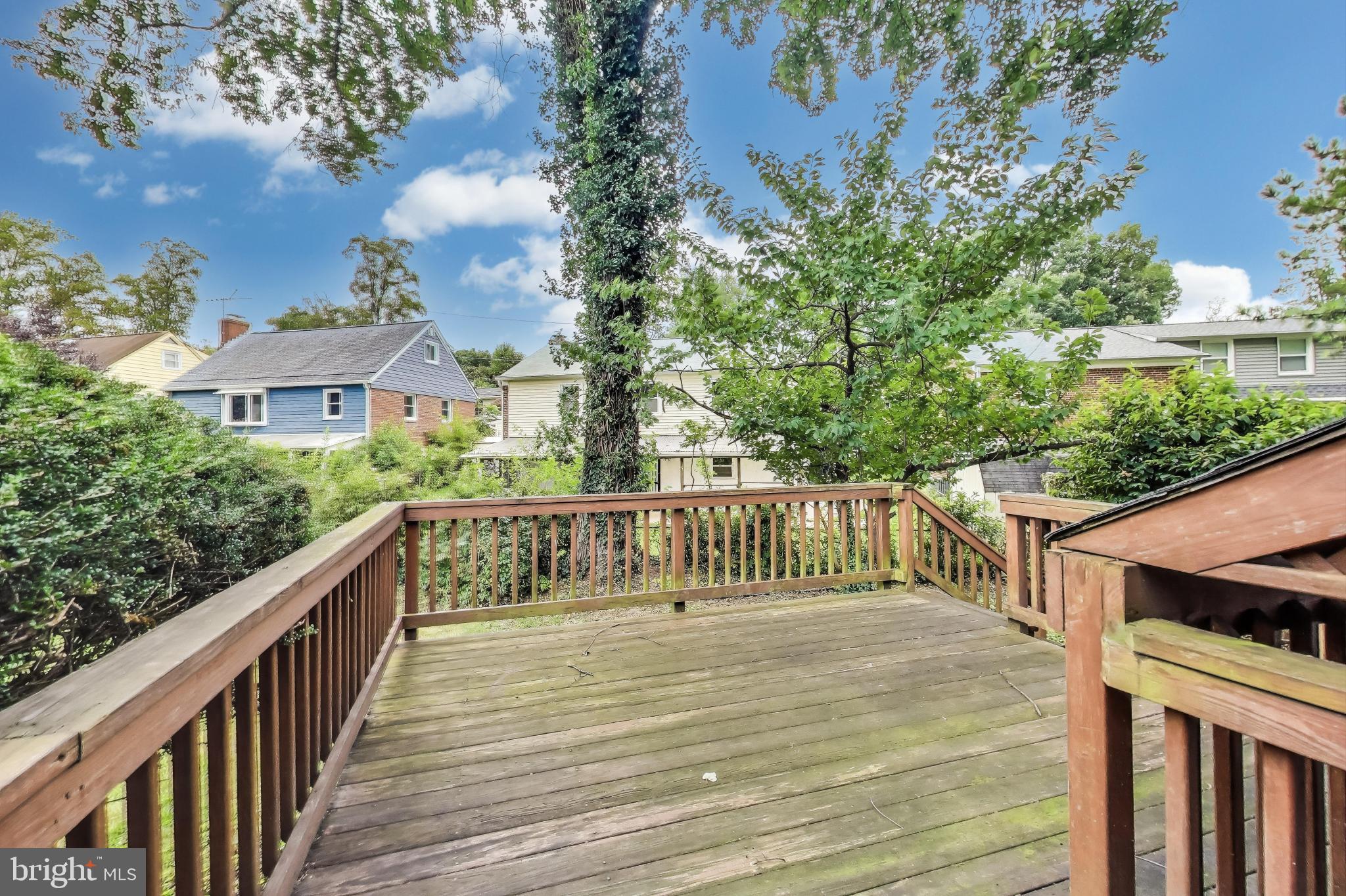 10019 Greenock Road Silver Spring, MD 20901 - Photo 31 of 39 a view of balcony with wooden floor and fence