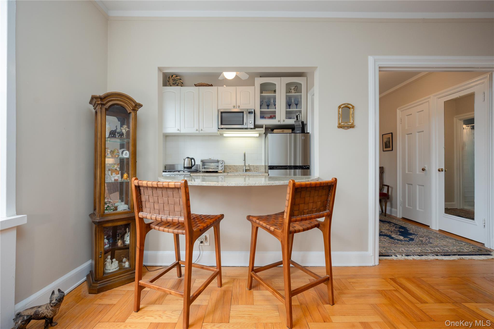 5 Midland Gardens, Unit 2K Bronxville, NY 10708 - Photo 9 of 15 Open from the kitchen with counter seating