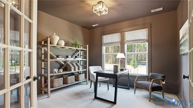 a view of a livingroom with furniture