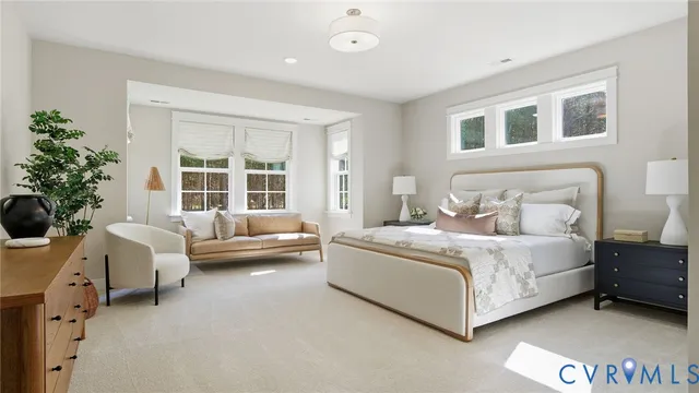 a bed room with a bed and a couch