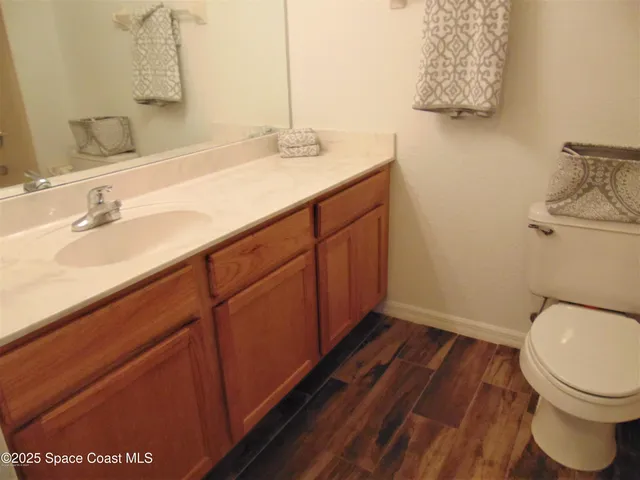 a bathroom with a sink and a toilet