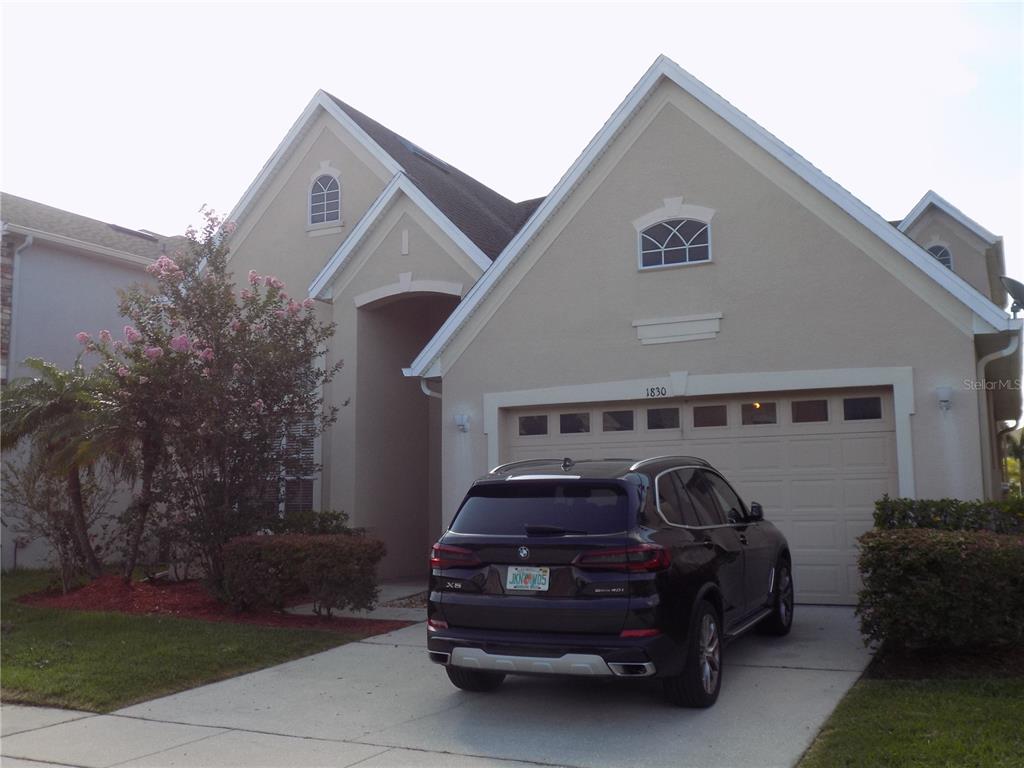Undisclosed Address Orlando, FL 32824 - Photo 1 of 1 a car parked in front of a house