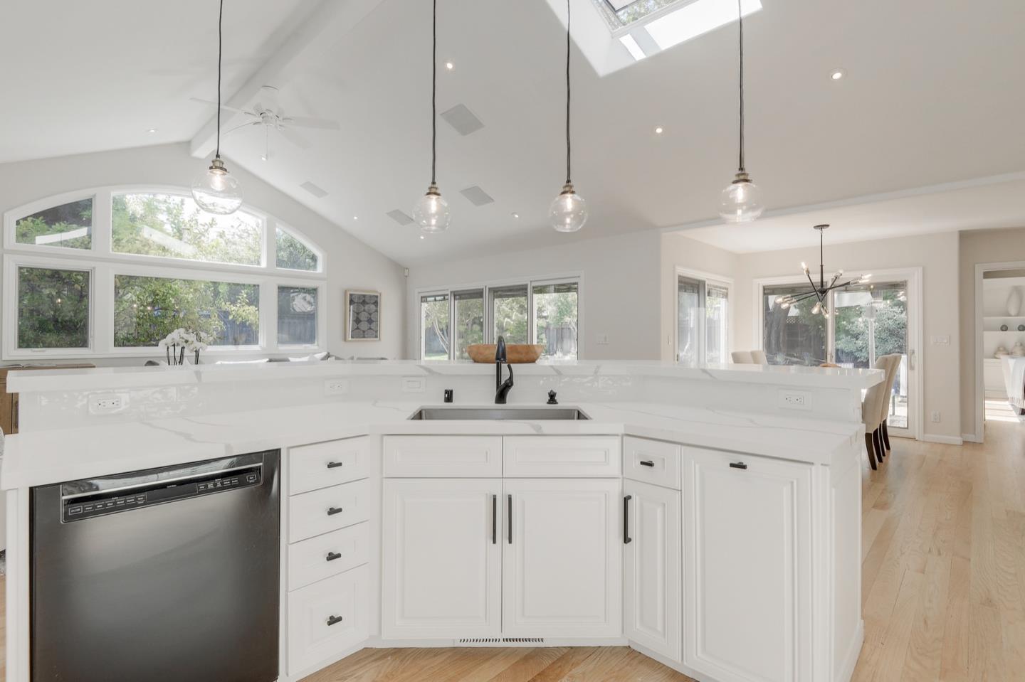 714 Arroyo Road Los Altos, CA 94024 - Photo 19 of 42 a kitchen with counter top space and a sink