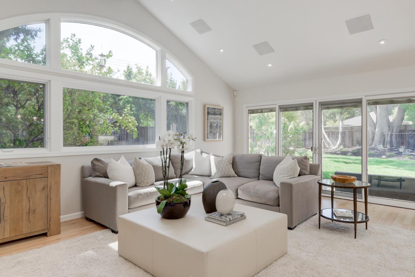 714 Arroyo Road Los Altos, CA 94024 - Photo 20 of 42 a living room with furniture and a large window