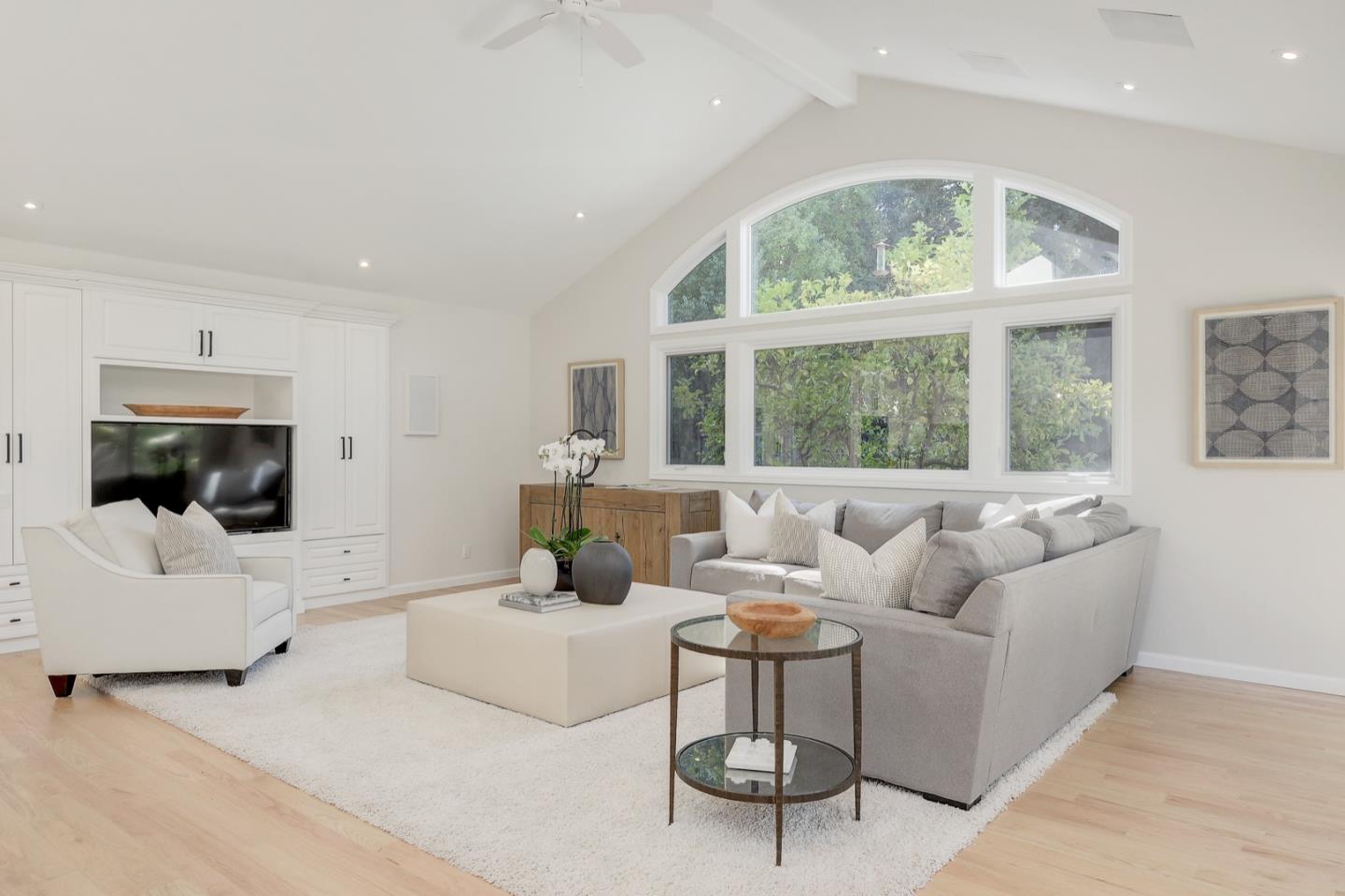 714 Arroyo Road Los Altos, CA 94024 - Photo 21 of 42 a living room with furniture and a flat screen tv