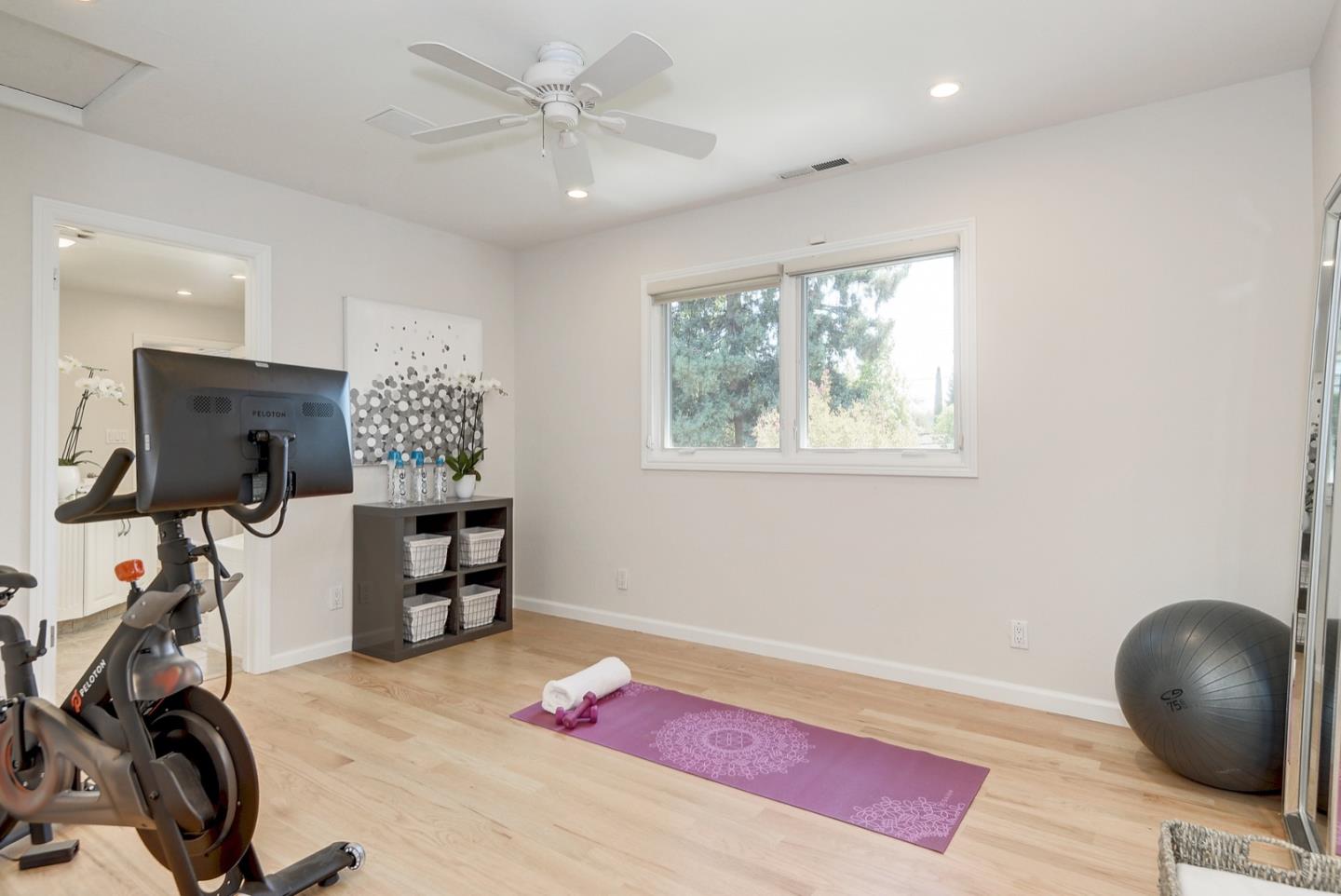 714 Arroyo Road Los Altos, CA 94024 - Photo 24 of 42 a view of a room with gym equipment