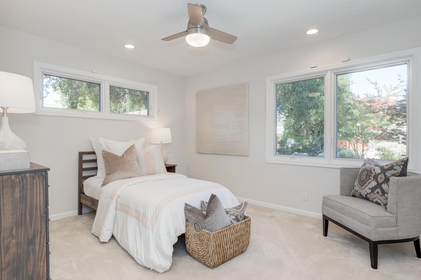 714 Arroyo Road Los Altos, CA 94024 - Photo 25 of 42 a bedroom with bed and a large window