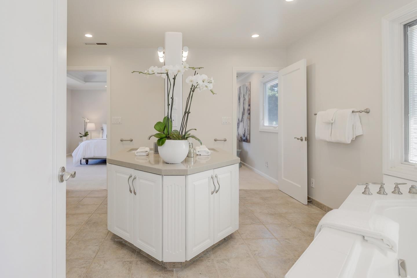 714 Arroyo Road Los Altos, CA 94024 - Photo 29 of 42 a spacious bathroom with a double vanity sink and shower