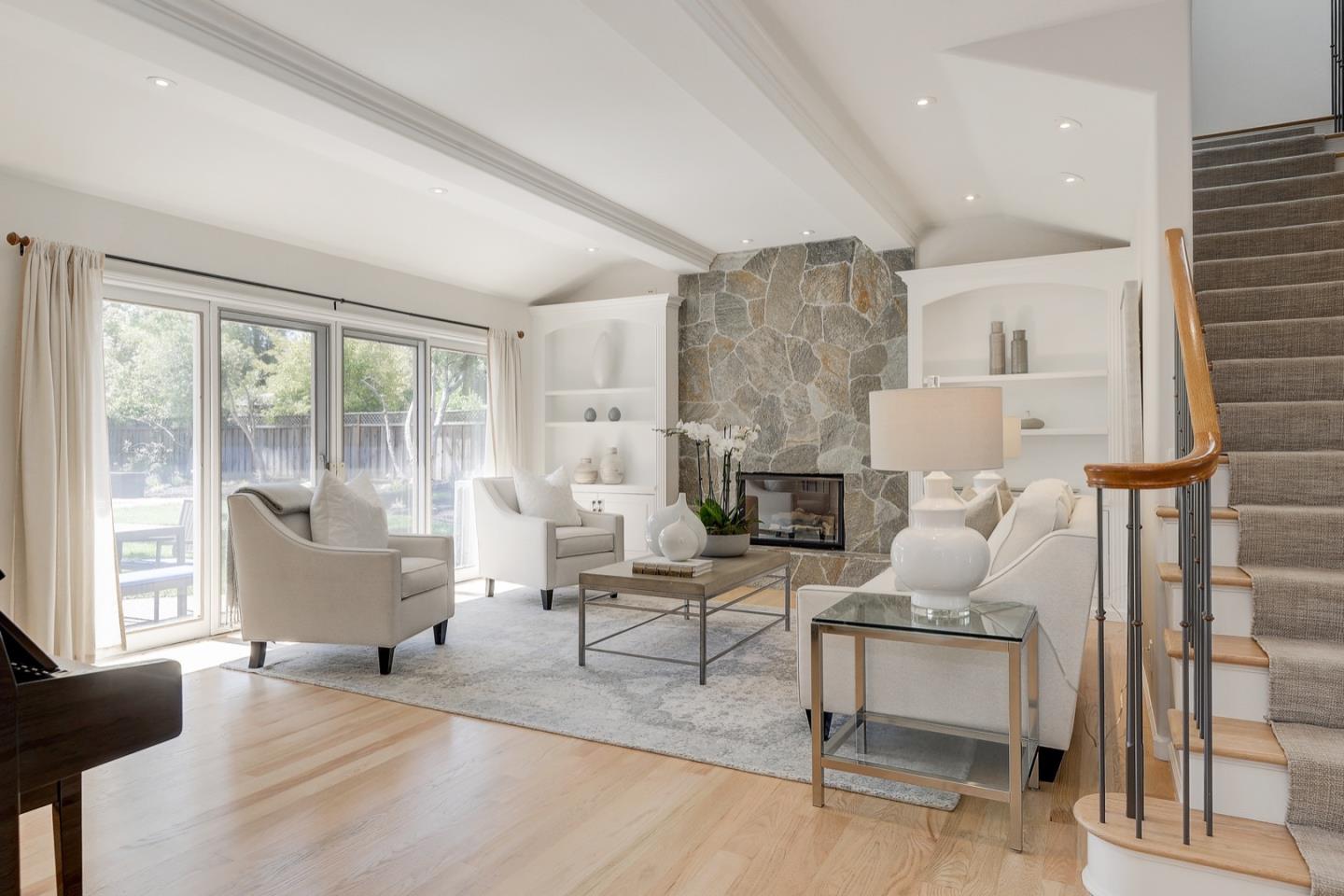 714 Arroyo Road Los Altos, CA 94024 - Photo 3 of 42 a living room with furniture and a fireplace