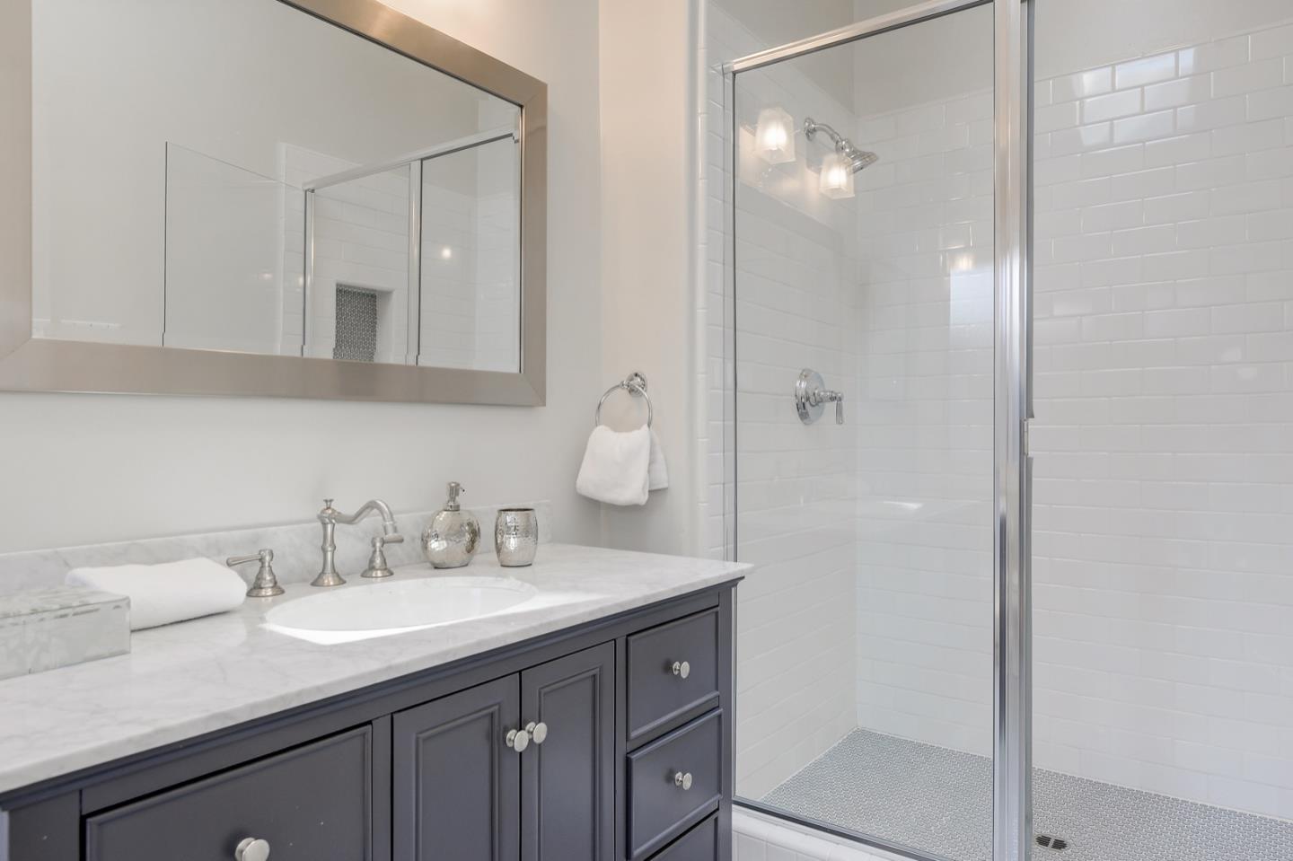 714 Arroyo Road Los Altos, CA 94024 - Photo 33 of 42 a bathroom with a sink and a mirror