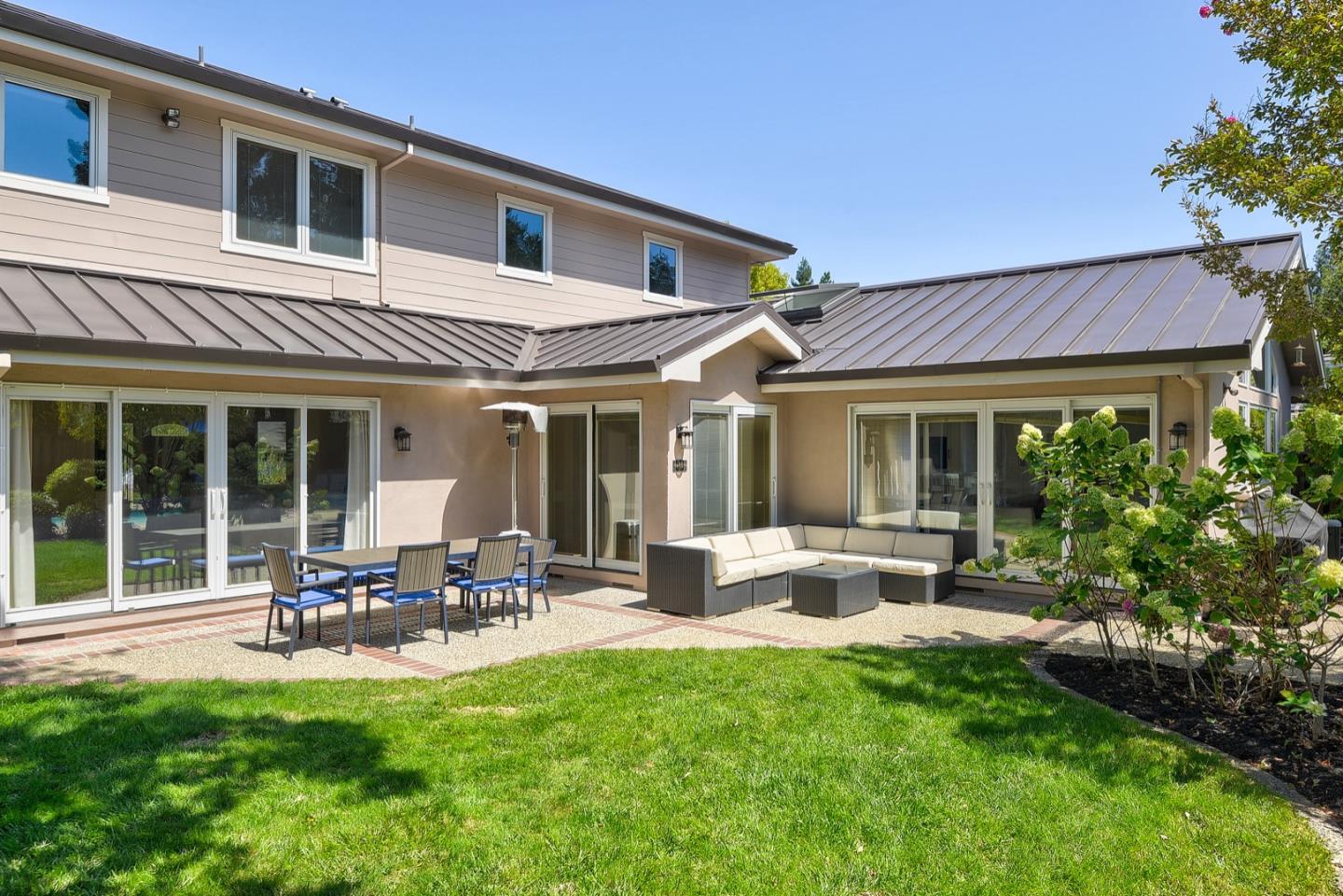 714 Arroyo Road Los Altos, CA 94024 - Photo 35 of 42 a house view with a sitting space and garden