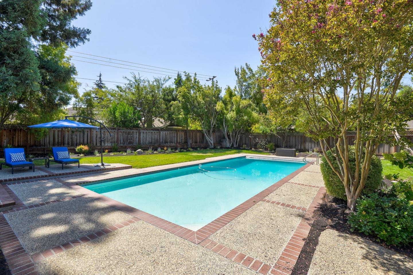 714 Arroyo Road Los Altos, CA 94024 - Photo 36 of 42 a view of a swimming pool with a yard
