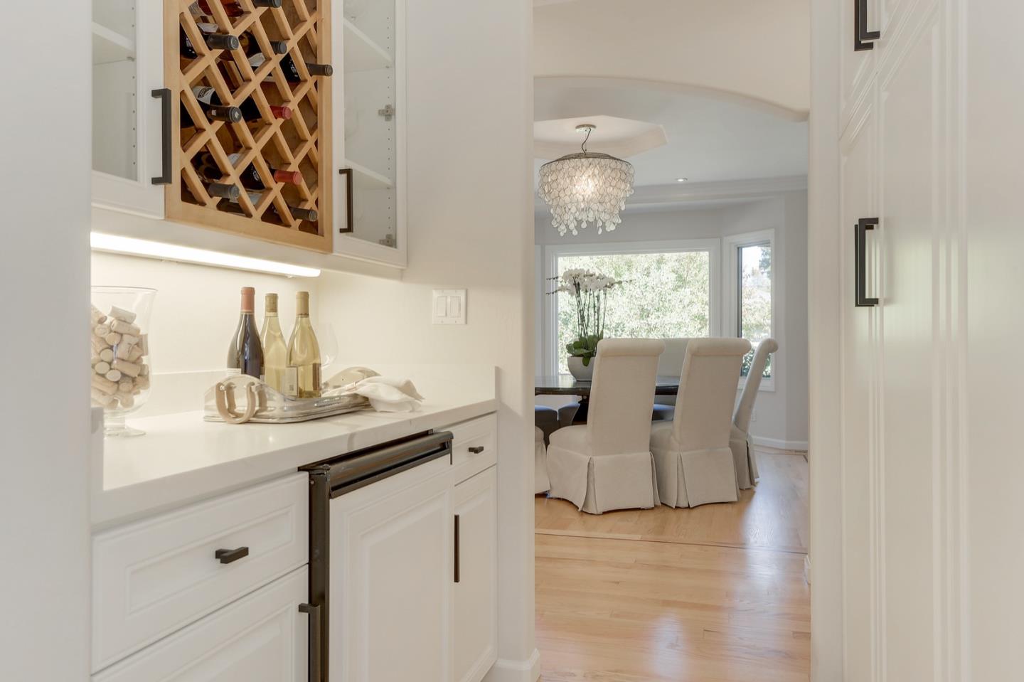 714 Arroyo Road Los Altos, CA 94024 - Photo 10 of 42 a view of living room with furniture and chandelier