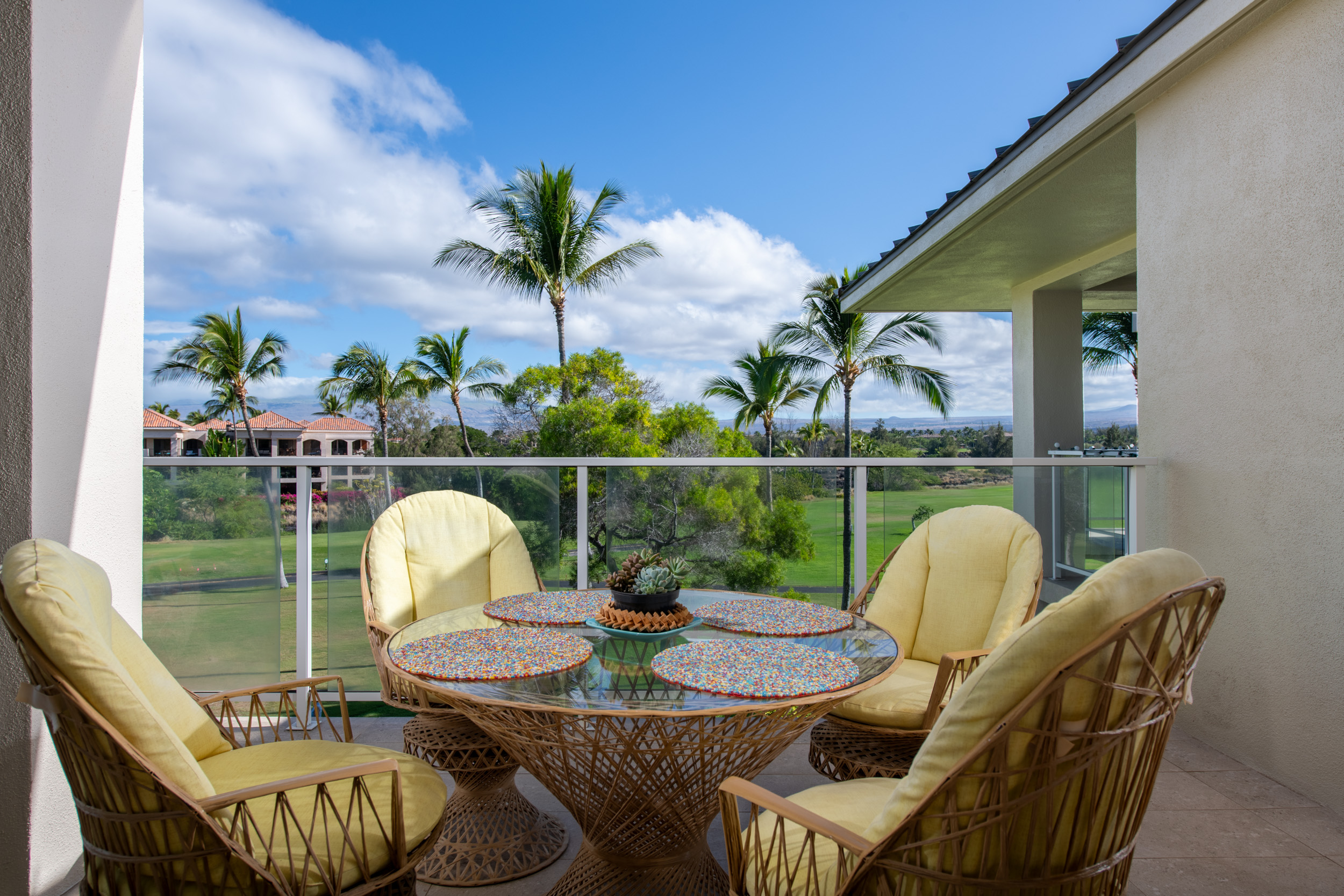 69-1010 Keana Place, Unit G303 Waikoloa, HI 96738 - Photo 20 of 30 a view of a chairs and table in patio