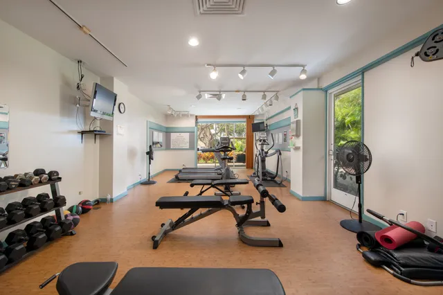 a view of a room with gym equipment