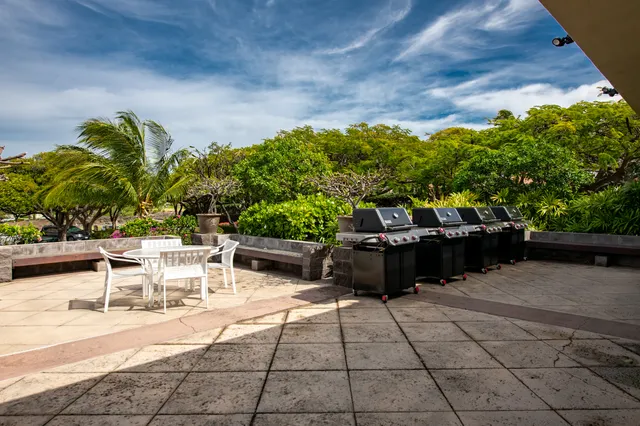 a view of a chairs and tables in the patio