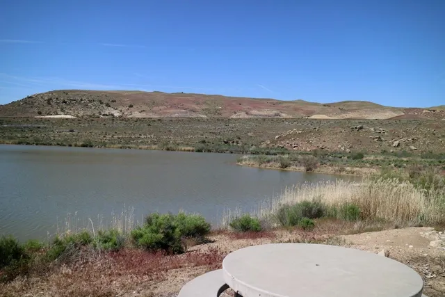 a view of a lake with a mountain in the background