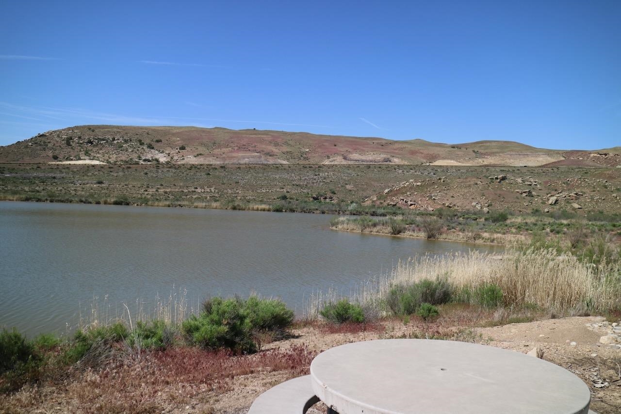 1346 Robinson Court Mack, CO 81525 - Photo 6 of 10 a view of a lake with a mountain in the background