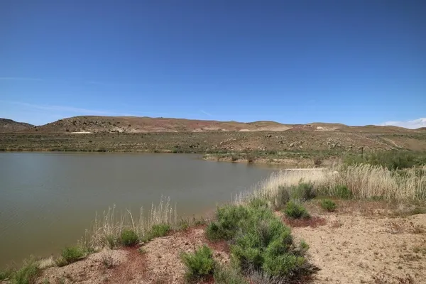 a view of lake with mountain