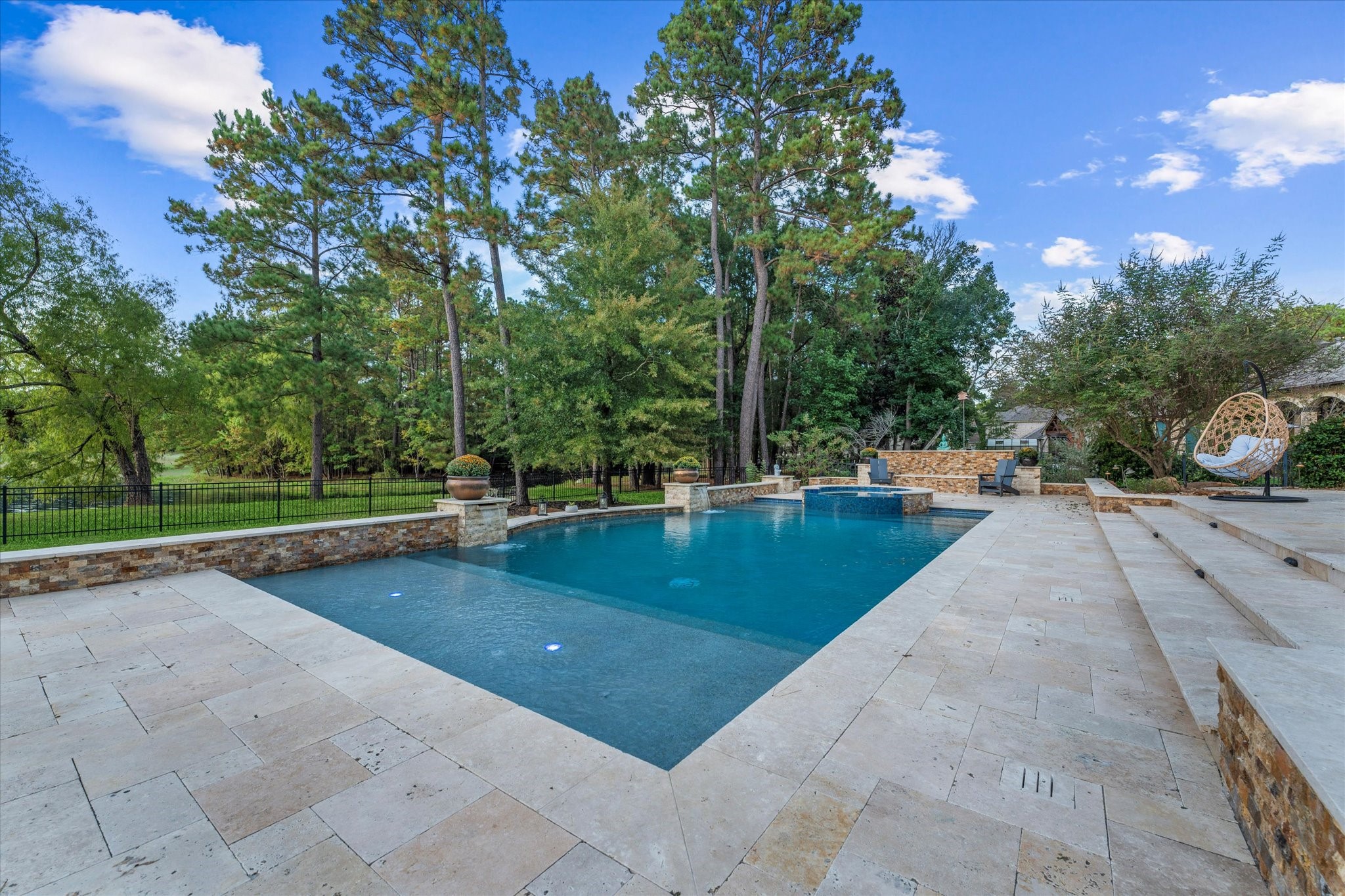28733 Lakeside Green Magnolia, TX 77355 - Photo 12 of 49 a view of a swimming pool with a patio
