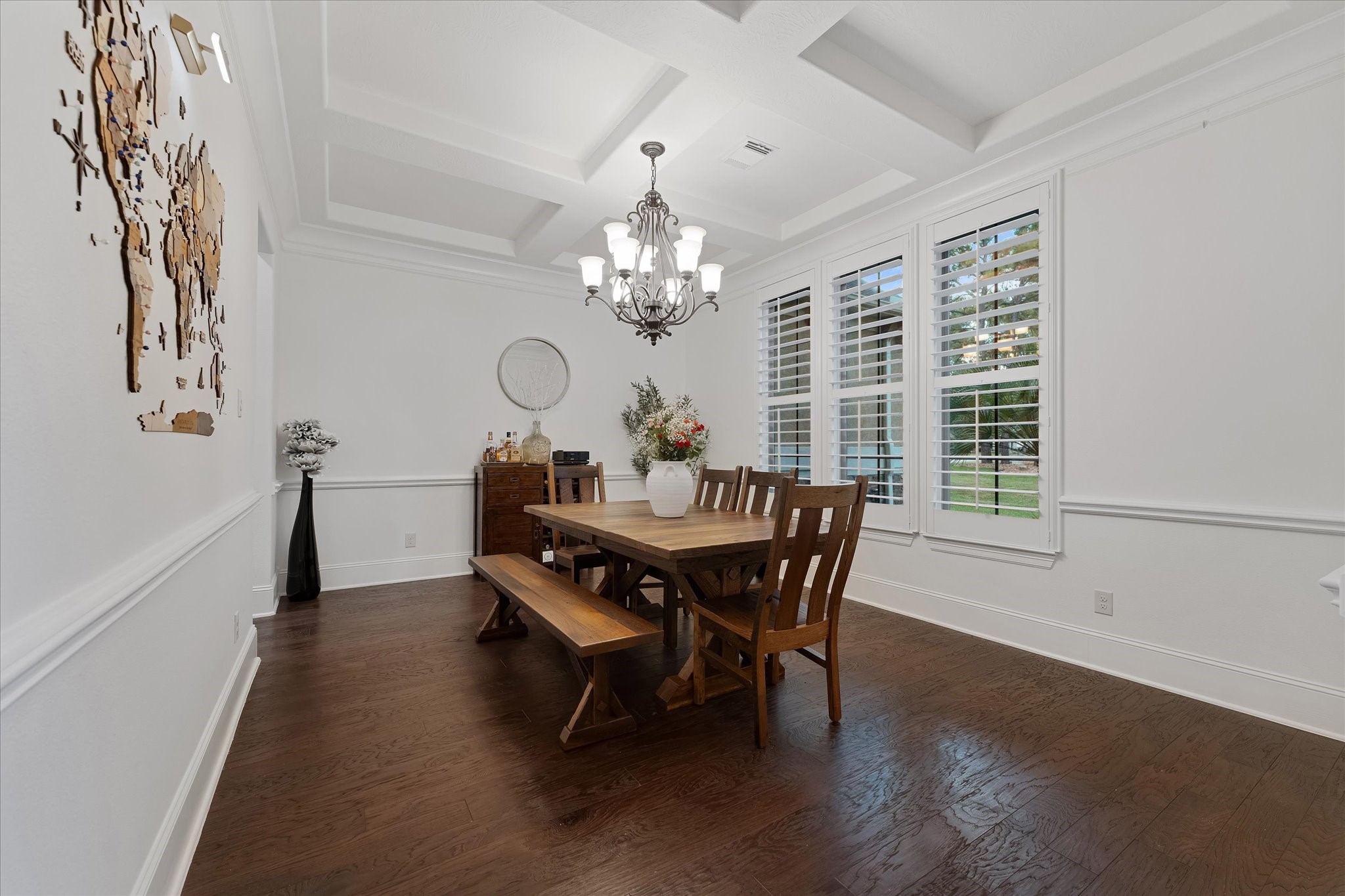 28733 Lakeside Green Magnolia, TX 77355 - Photo 20 of 49 a dining room with furniture a chandelier and wooden floor