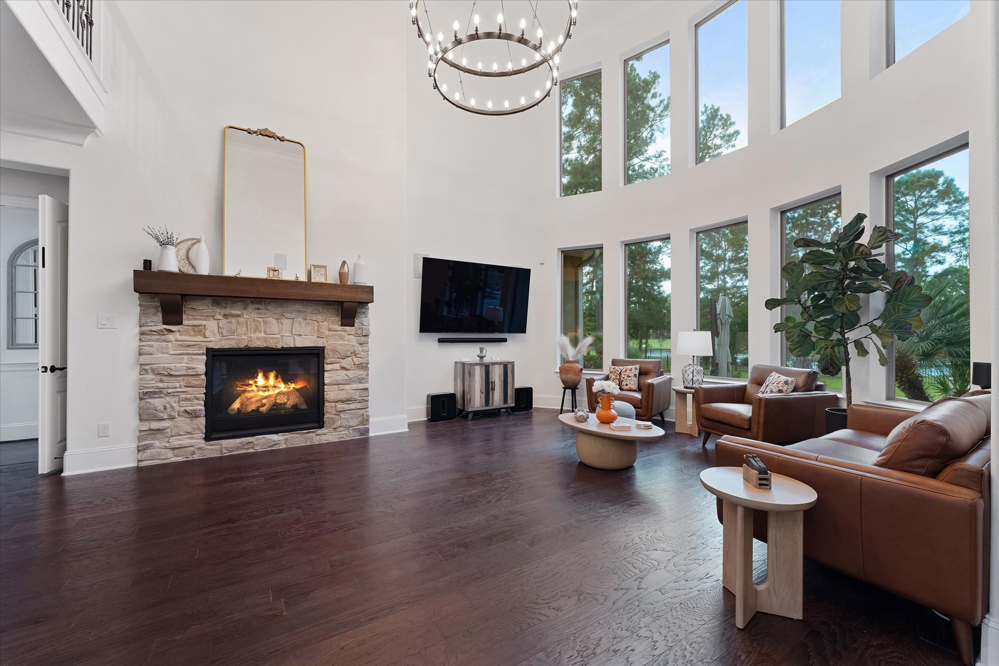 28733 Lakeside Green Magnolia, TX 77355 - Photo 21 of 49 a living room with furniture fireplace and flat screen tv