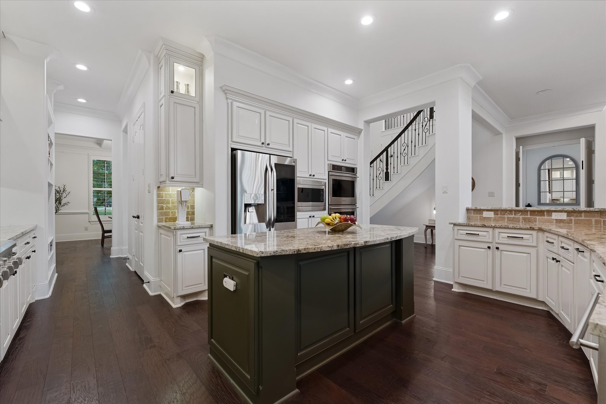 28733 Lakeside Green Magnolia, TX 77355 - Photo 26 of 49 a kitchen with stainless steel appliances granite countertop a sink stove and refrigerator