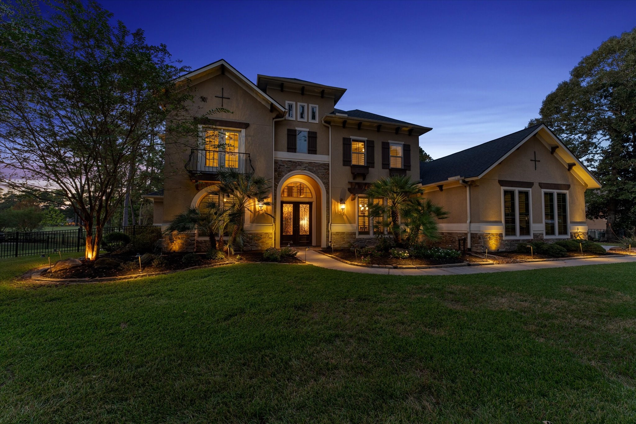 28733 Lakeside Green Magnolia, TX 77355 - Photo 3 of 49 a front view of a house with swimming pool having outdoor seating