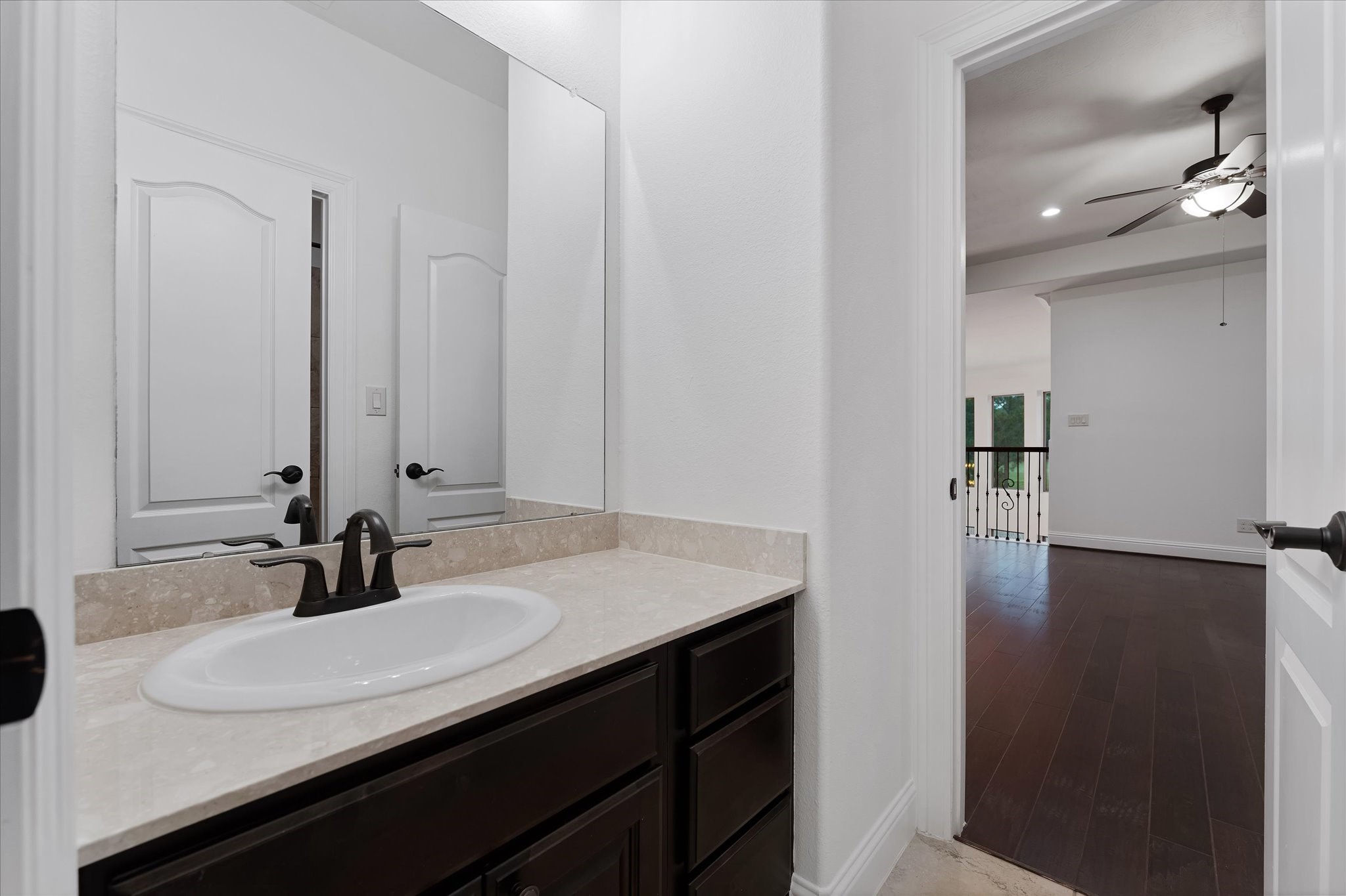 28733 Lakeside Green Magnolia, TX 77355 - Photo 43 of 49 a bathroom with a sink and a mirror
