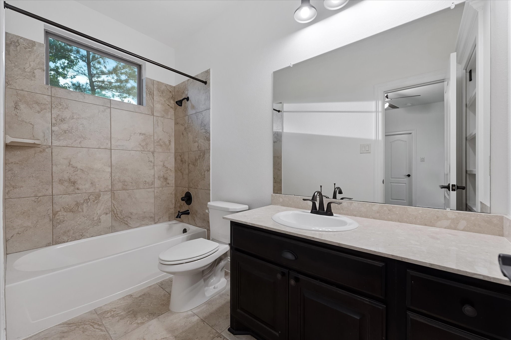 28733 Lakeside Green Magnolia, TX 77355 - Photo 47 of 49 a bathroom with a sink a toilet and shower