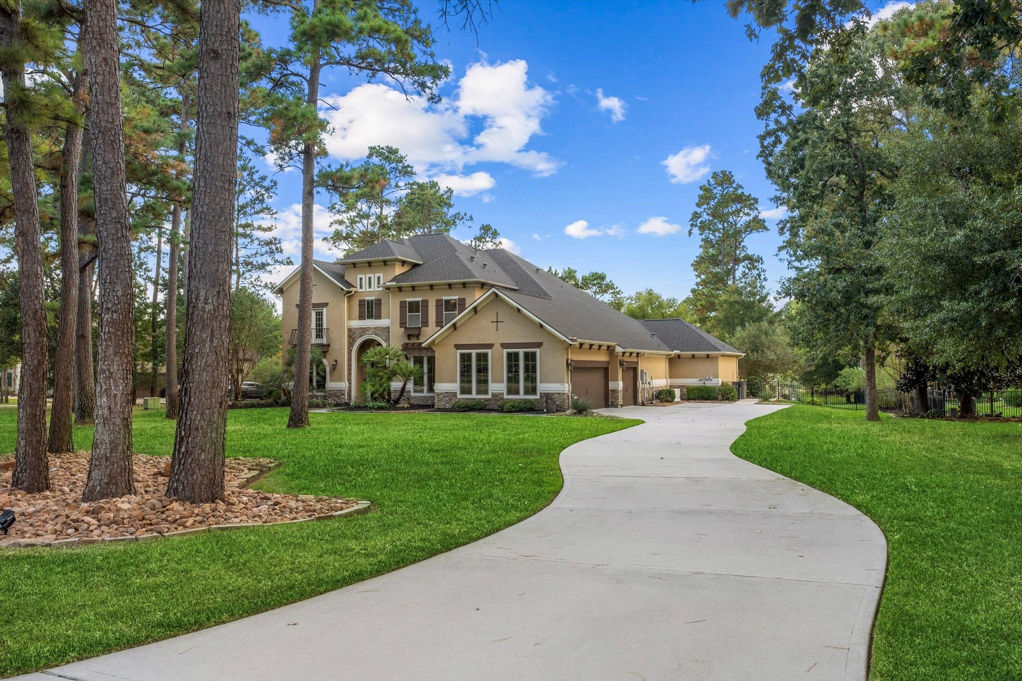 28733 Lakeside Green Magnolia, TX 77355 - Photo 7 of 49 a front view of a house with a yard