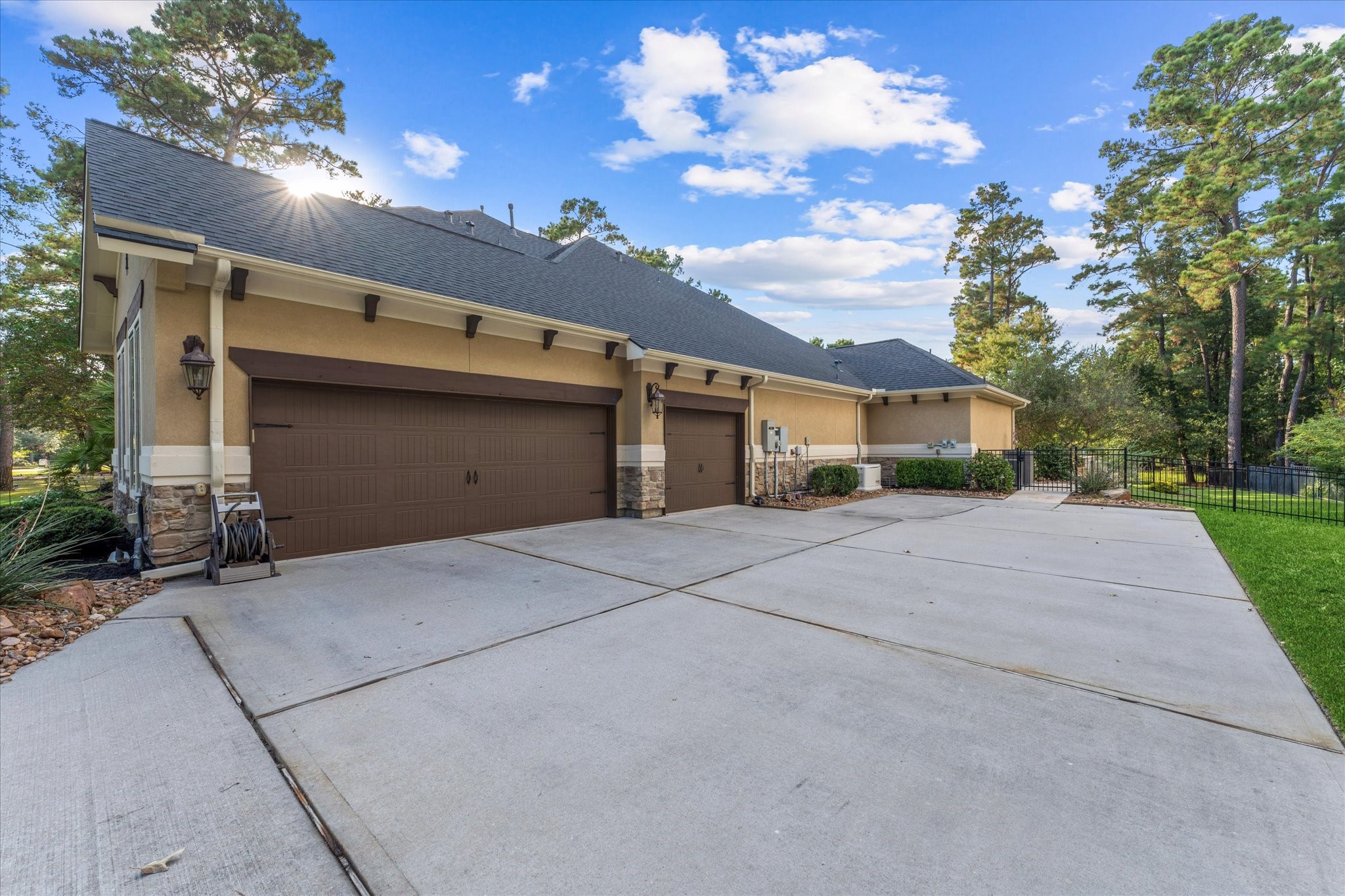 28733 Lakeside Green Magnolia, TX 77355 - Photo 8 of 49 a front view of a house with a yard and garage